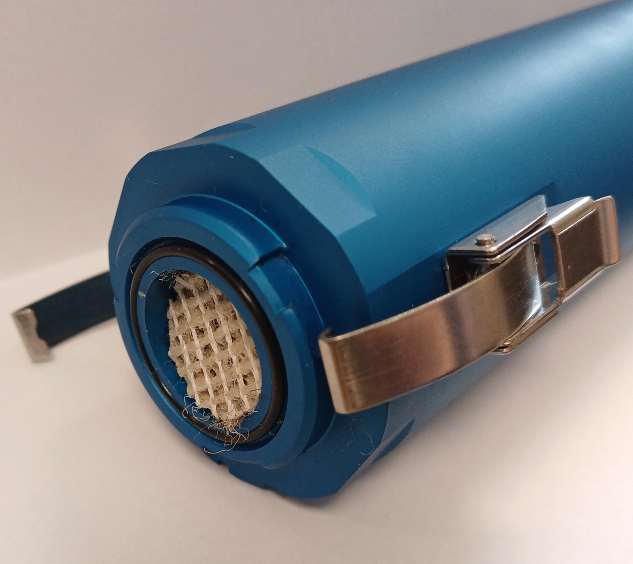 Tilted sample of 6 mm thick carpet inside measurement tube tilted_sample